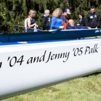 John '04 and Jenny '05 Palk written on side of boat